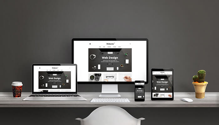 webサイトがさまざまなデバイスで映し出されている様子のイメージ画像